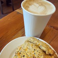Sausage and cheese scone & latte  at Mud Pie Vegan Bakery and Coffee in Kansas City