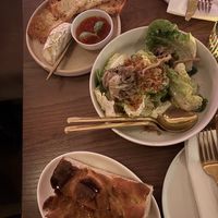 Starters: cashew brie and red pepper jam, pickled mushroom salad, focacciaa  at Gia in Toronto
