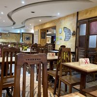 Sitting at Broth Restaurante in Rio De Janeiro