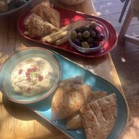 Hummus, olives and bread   at Cedar Cafe in Naxos
