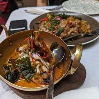 Fish in curry sauce (background drunken noodles) at Mali Vegan Thai in South West London
