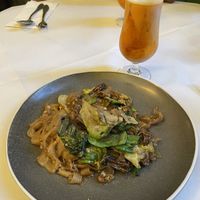 Pad see ew and boozy thai milk tea  at Mali Vegan Thai in South West London