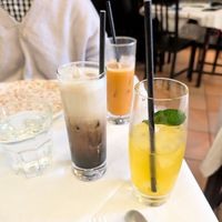 Milk tea at the back (stirred), milk coffee next, mango tea closest to the front at Mali Vegan Thai in South West London