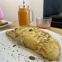 French Omelette stuffed with salad, cucumber, tomato, cheese and avocado    at AUYAMA real food in Tenerife