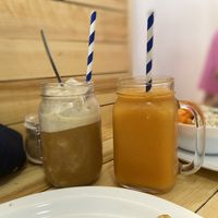 Left: iced cinnamon coffee shake made with coconut milk. Right: Papaya Passion- papaya, orange, lime, mint  at AUYAMA real food in Tenerife