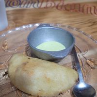 empanada, not sure about the sauce though! at El Rincon Colombiano in El Valle De Anton