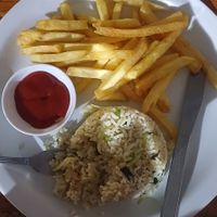 Vegetable rice with chips  at El Rincon Colombiano in El Valle De Anton