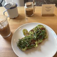 Avocado, dried tomato, and arugula tostada   at Noat Coffee in Granada