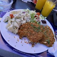 Celery schnitzel with potato salad.  at Munich in Lagos