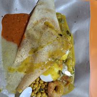 Dosa with idly underneath and a free vadaa at S.P. Villas in Central Singapore