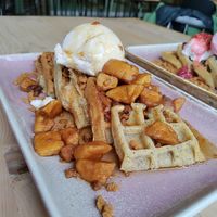 Winter special. Waffles, maple syrup, spiced apple, biscoff crumbs, vanilla ice cream (vegan) at Out-there Artisan in Jedburgh