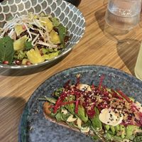 Crispy tempeh bowl, avocado toast and Korean fried cauliflower   at Veganees in Amsterdam