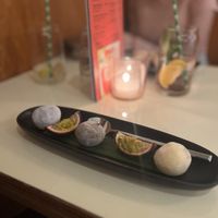Mochi in 3 flavours: chocolate, yuzu cashew and passion fruit (€7,50)🍫  at Veganees in Amsterdam