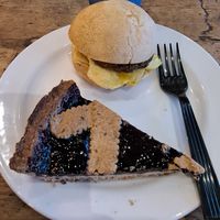 Vegan Breakfast Sandwich, Elderberry Rasberry Vegan Tart and Mocha Latte with Oat Milk at Caffe Nero - Washington St in Boston