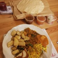Tofu roshun, Chennai tofu, veg pilau, veg samosa, chips and poppadoms and vegan pickles at Indian Brasserie in South Shields