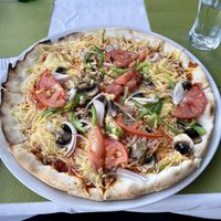 ‘Vegetarian’ pizza with vegan cheese on a gluten free base  at Cucina Italiana in Kos