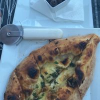 Garlic bread and unpitted olives   at Cucina Italiana in Kos