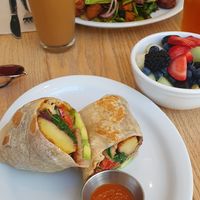 Burrito, fruits, vegan breakfast plate at Heist Cafe in San Francisco