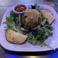 Stuffed pepper with cheeze sauce  at Pauseitively Vegan in Deerfield Beach