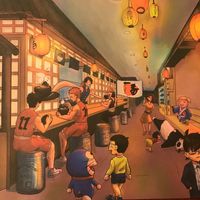 Mantel de papel con varios personajes de anime at Ichiban Ramen & Street Food in Barcelona