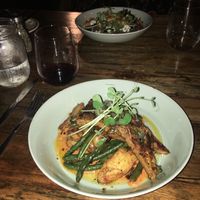 tempeh with a tomato red pepper type sauce and green beans and fingerling potatoes  at The Floridian in St Augustine