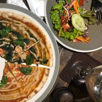 2 sorts of vegan pizza with side salad. Hubby ate to quick to get a better pic. at Soma Cafe in Ubud