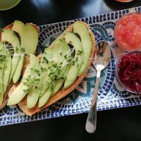 Avo toast with pesto tomato and beetroot at REVIV in Malaga