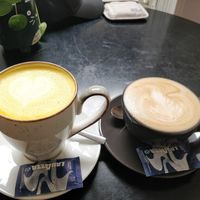 Curcuma latte and capuccino with oat milk at REVIV in Malaga