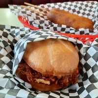 BBQ jackfruit pulled-pork-style sandwich, state fair batter vegan corndogs at Vegan Junk Food in Portland