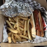 Hotdogs with a side of fries  at Vegan Junk Food in Portland