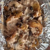 Loaded potato fries with crispy vegan bacon, caramelized onions, and thousand island sauce.  at The Wagon in Portland