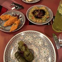 Kibbeh net, Syrian bread, baba ganoush, warak anib, lemon mint juice  at Sha'aam in Valkenburg