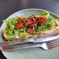 Avocado/Hummus toast (order without pesto = vegan) at Fusion Café y Panaderia in San Sebastian