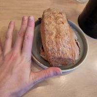 Trying to show the scale of the giant pain au chocolat at Stir - Chesterton in Cambridge