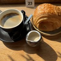 Americano + oat milk (extra charge), vegan pain au chocolat 👌🏻  at Stir - Chesterton in Cambridge