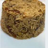 Gluten & Vegan
A delicious Middle Eastern rice, lentils & onions entree, served with a side salad
 at Boon Cafe in Norridge