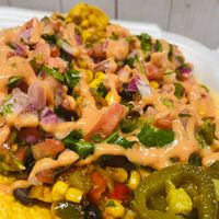 Vegan & Gluten Free loaded nachos
[in house made cheese sauce] at Boon Cafe in Norridge