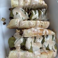 Cheese steak + pickles   at Mike's Vegan Grill in Greensboro