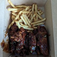 Sticky BBQ wings 🤤 at Dhil's in Wigston