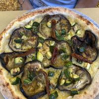 Crema di pomodorini gialli, melanzane arrosto, zucchine trifolate e pomodorini semi secchi   at Il Rovescio in Bologna