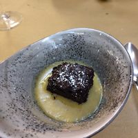 Chocolate cake with spice custard at Il Rovescio in Bologna