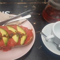 Tomato toast with avocado topping at Ratiños Coffee Shop in Santiago De Compostela
