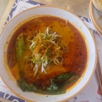 Spicy Miso Tantanmen: Shiitake dashi, spicy sesame & miso tare, Sapporo noodles, plant-based spiced mince, pak choi, spring onion, crunchy chilli oil at House of Fu in Leeds