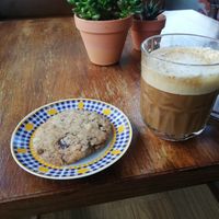 Chocolate chip cookie and cappucchino at Cantinho do Mercado in Vila Nova De Milfontes