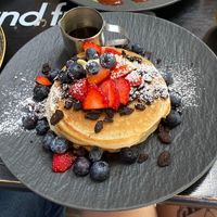 Oreo heaven pancakes with extra added strawberries and blue berries😍  at Mr NonNo - Center in Rotterdam