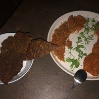 Romanian starter - Zacusca with Serbian ajvar. Came with homemade seed crackers  at Verv Kitchen in Bucharest