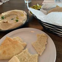Israeli hummus is like nothing else! Warm, silken, creamy. Top with tahini or sautéed mushrooms!  at Grand Café in Hollywood