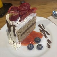cake with cream and berries  at AMA in Medellin