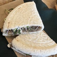 Tapioca crepe with mushrooms, cashew cheese, caramelized onion, dried tomatoes   at Om Plante in Magog