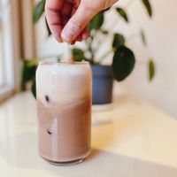 Several coffee options with different plant-based milks  at Yum Baaar in Segovia